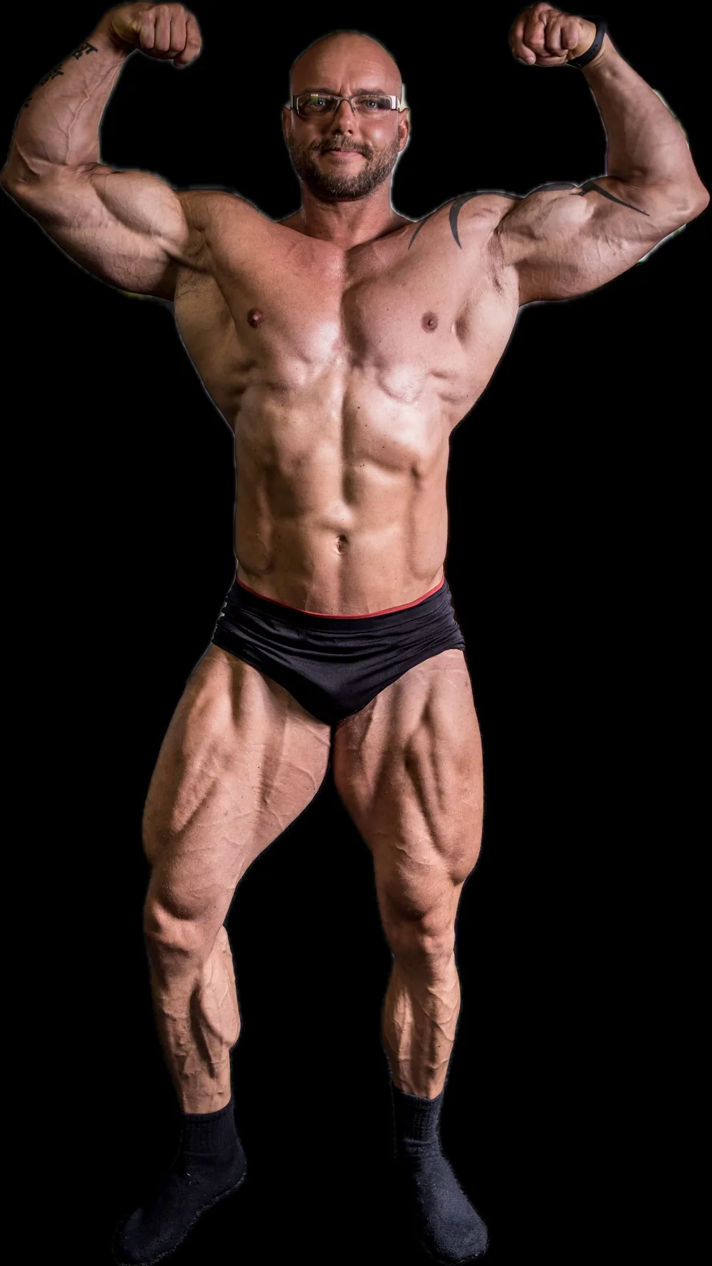 Jörg Dumke auf der Bühne einer Bodybuilding-Meisterschaft